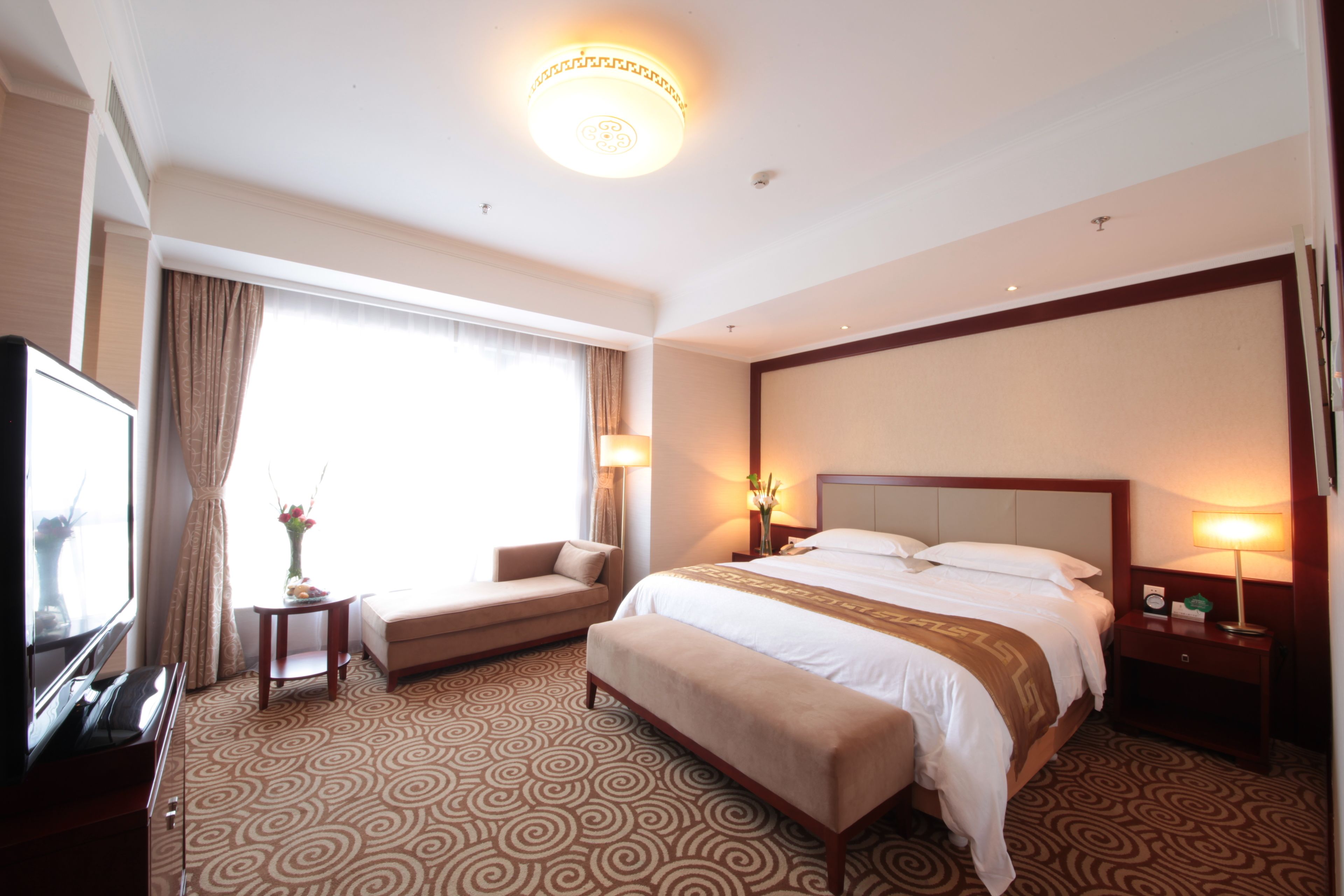 deluxe suite | premium bedding, down duvets, minibar, in-room safe