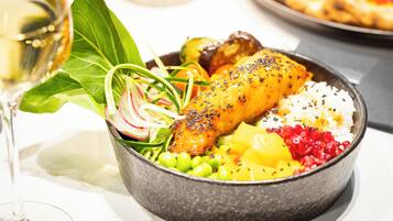 A bowl of food with various ingredients.