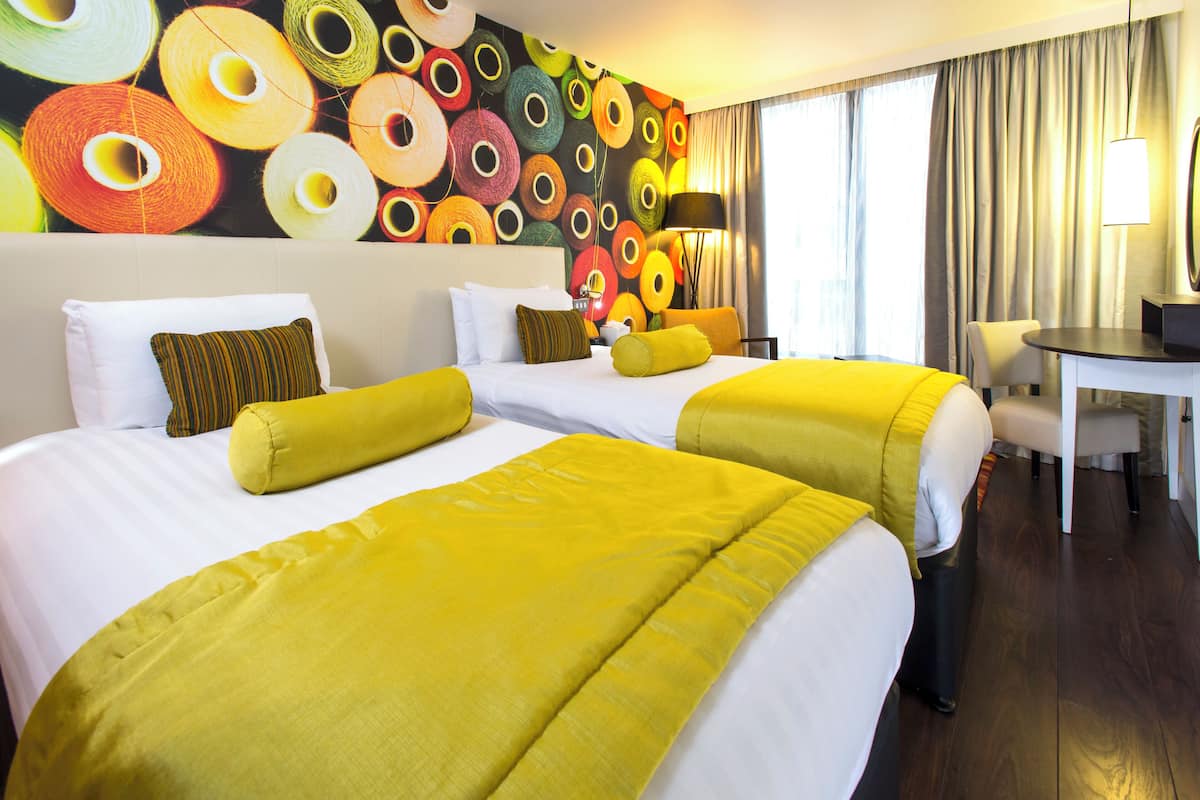 Hypo-allergenic bedding, free minibar, in-room safe, desk