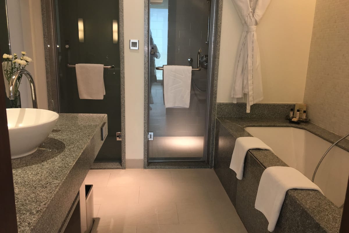 rainfall showerhead, designer toiletries, hair dryer, bathrobes