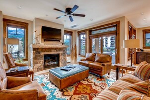 Condo, 4 Bedrooms | Living area | Flat-screen TV, DVD player