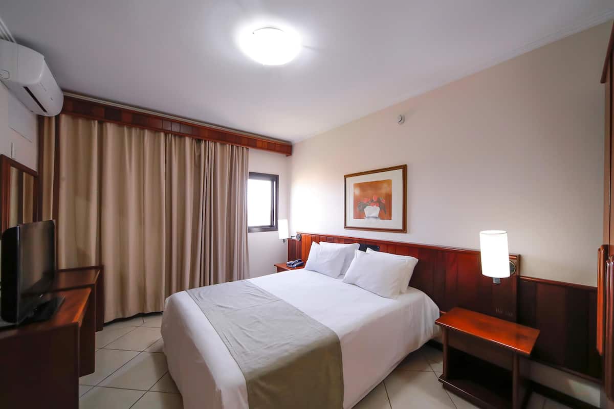1 habitación, minibar y caja de seguridad en la habitación