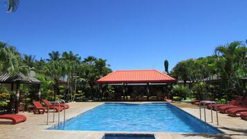 Outdoor pool, open 9:30 AM to 7:00 PM, pool loungers