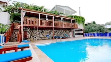 Outdoor pool, pool umbrellas, pool loungers