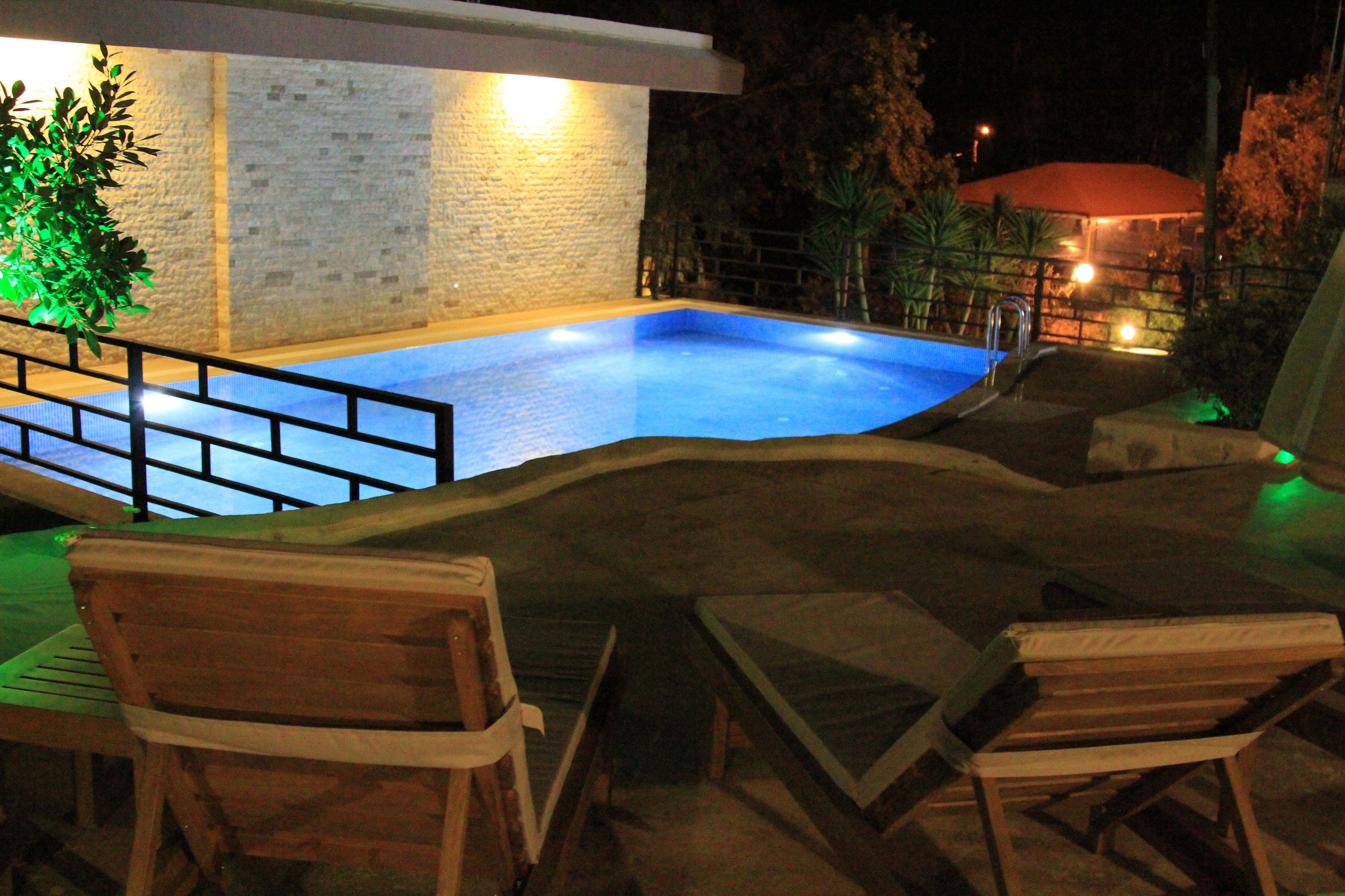 outdoor pool, pool loungers