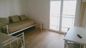 Habitació quàdruple, vistes al mar | Wifi gratuïta 