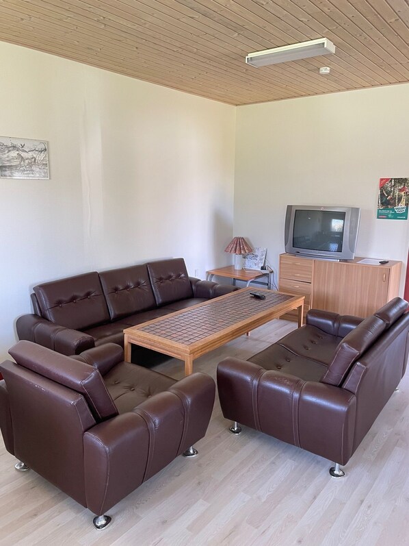 Quadruple Room, (excl. linen) Shared Bathroom - 4 people | Living area