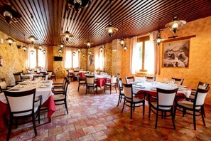 Breakfast, lunch, dinner served; local cuisine 