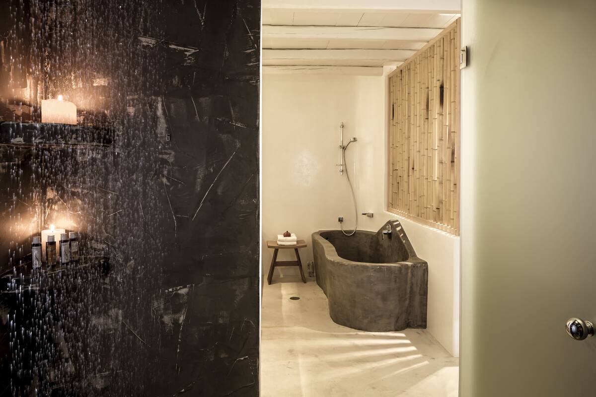 designer toiletries, hair dryer, bathrobes, slippers