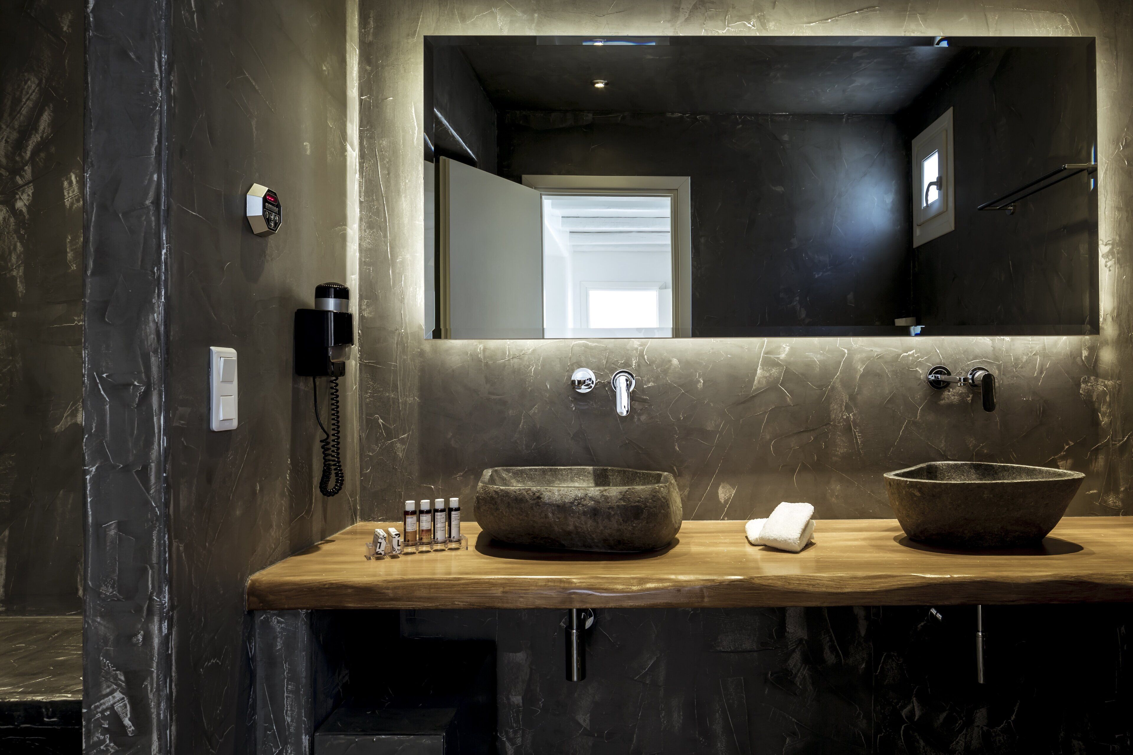 designer toiletries, hair dryer, bathrobes, slippers