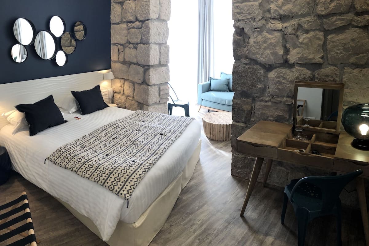 Junior Suite, Pool View | 1 bedroom, premium bedding, in-room safe, individually decorated