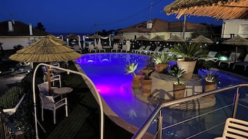 Outdoor pool, open 8:00 AM to 9:00 PM, pool umbrellas, pool loungers