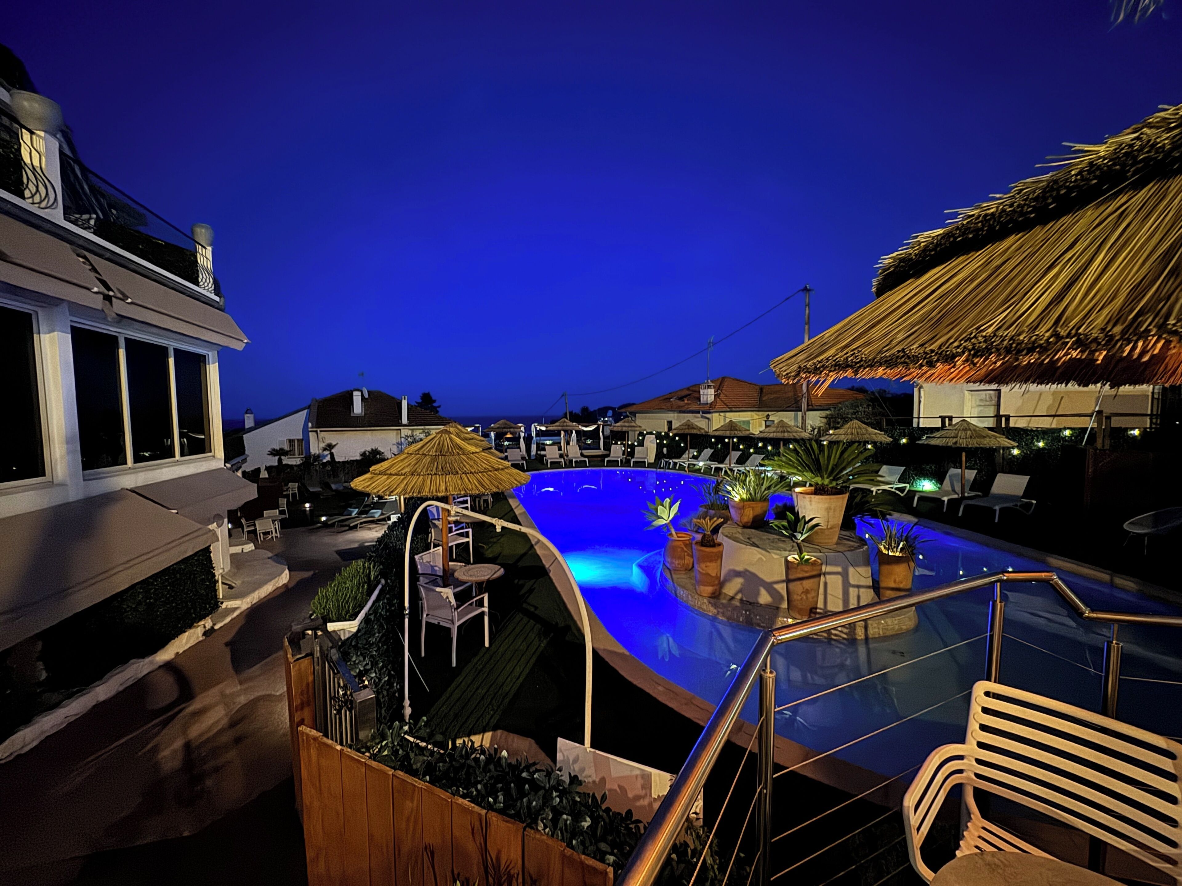 outdoor pool, open 8:00 am to 9:00 pm, pool umbrellas, pool loungers