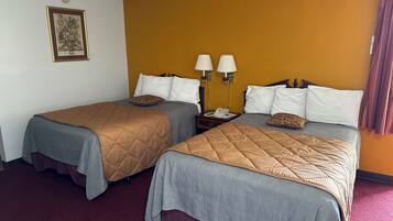 Room, 2 Double Beds | Individually decorated, individually furnished, desk, iron/ironing board