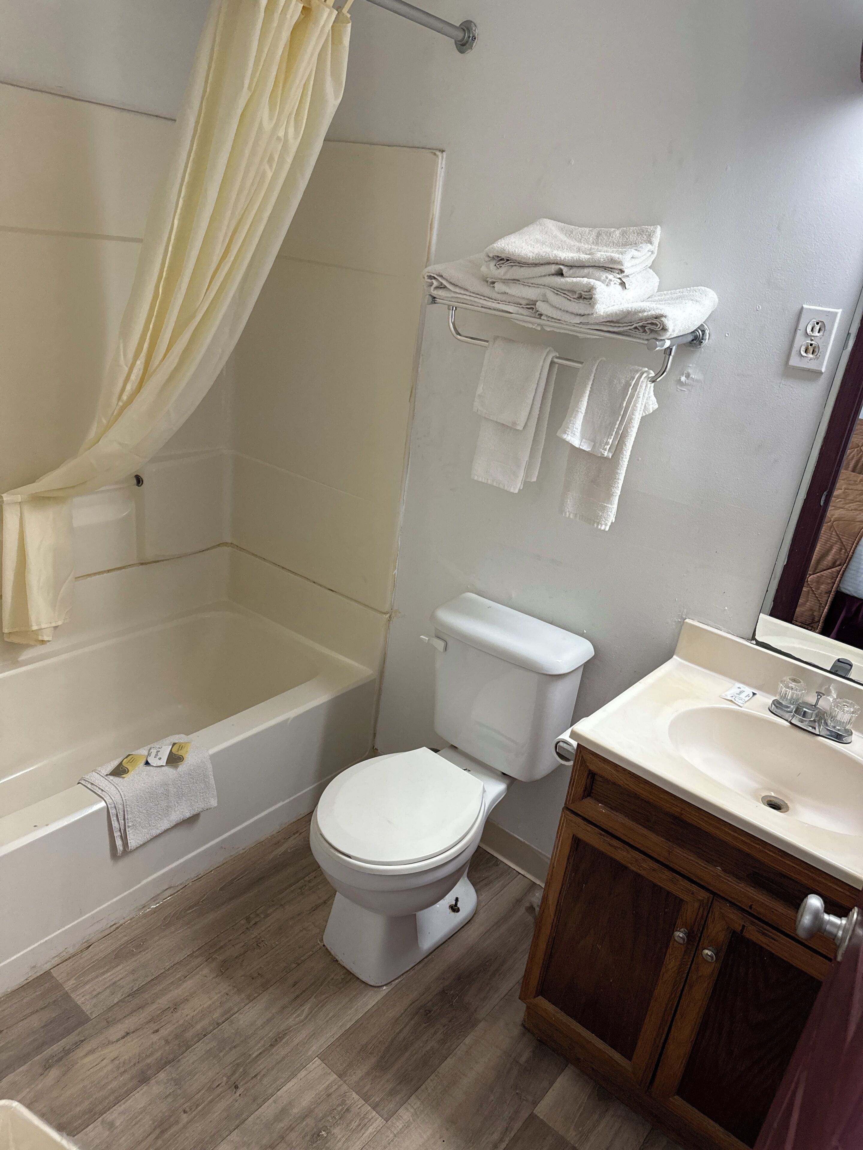 Room, 2 Double Beds | Bathroom | Combined shower/tub, free toiletries, hair dryer, towels