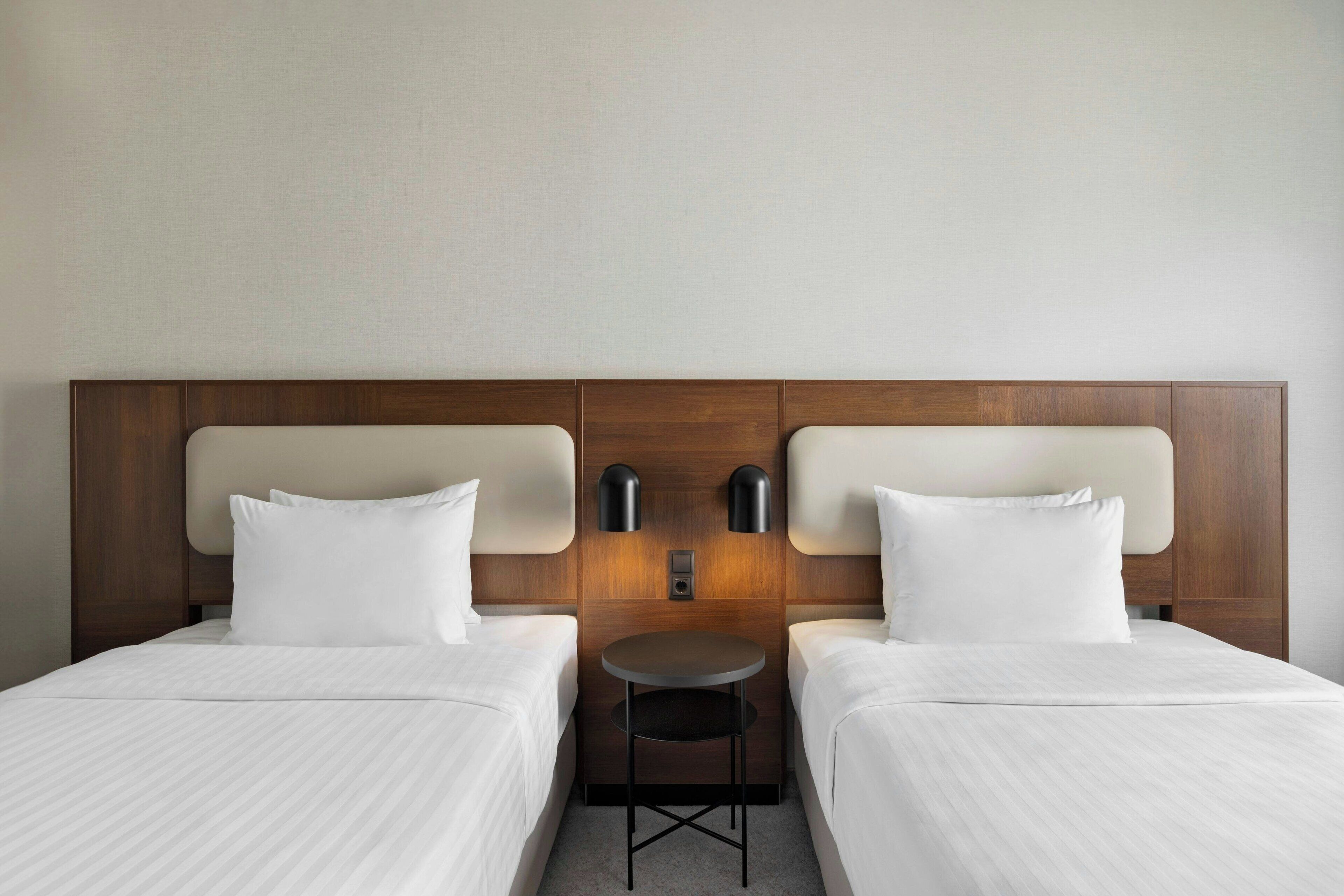 superior room, 2 single beds, courtyard view | 1 bedroom, premium bedding, pillow-top beds, in-room safe