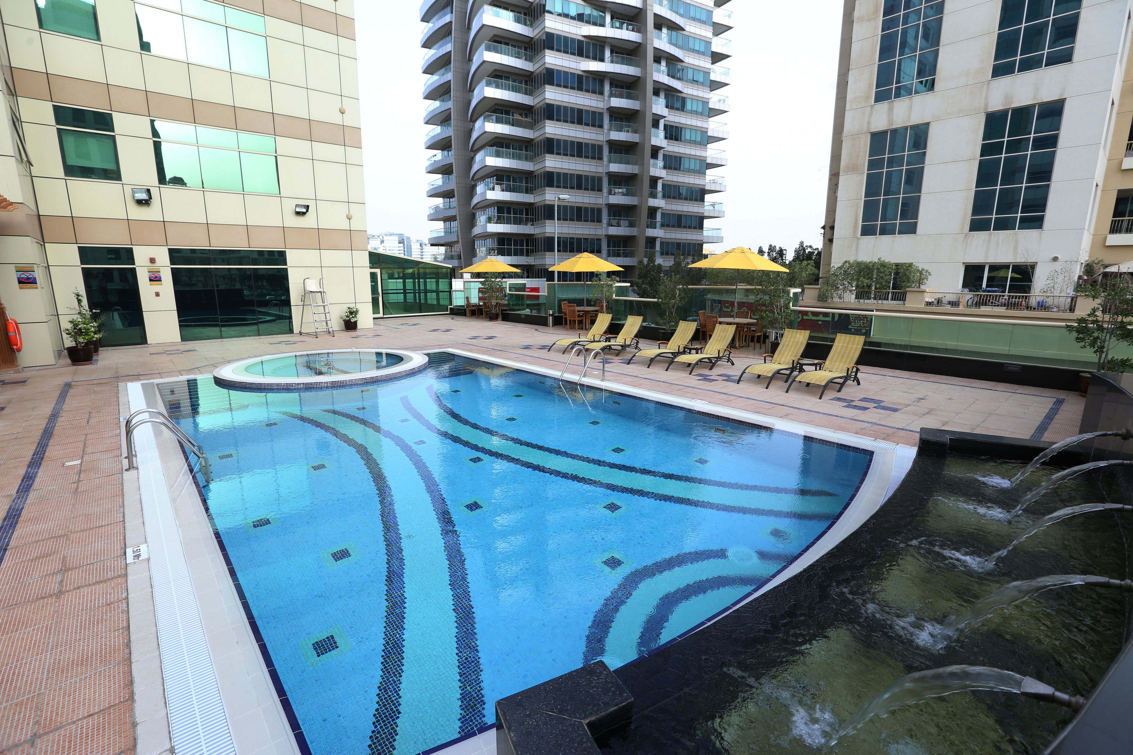 Outdoor pool, open 8:00 AM to 9:00 PM, pool umbrellas, pool loungers