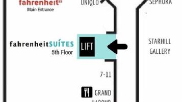 A floor plan with 'fahrenheit SUITES' on the 5th floor, a 'LIFT' sign, and a 'TAXI STAND' at the bottom.