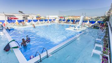 Seasonal outdoor pool, pool umbrellas, pool loungers