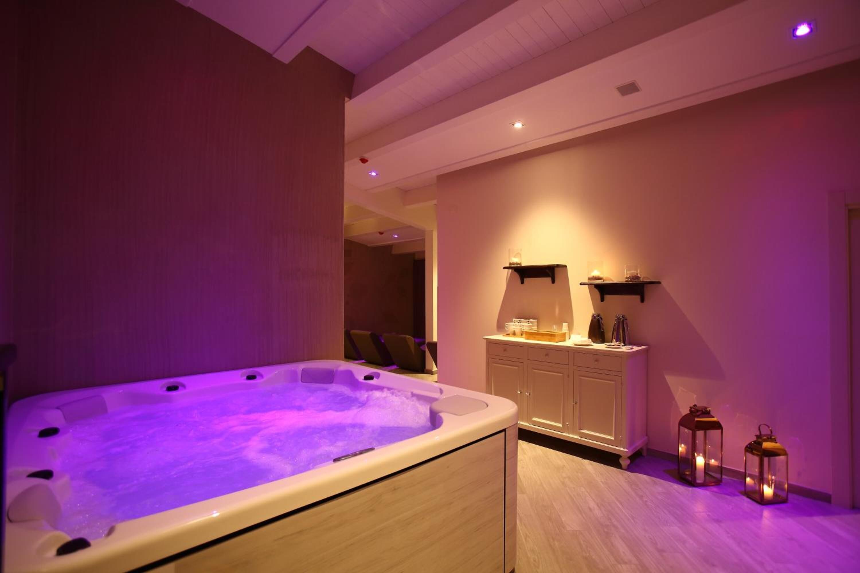 Shower, designer toiletries, hair dryer, slippers