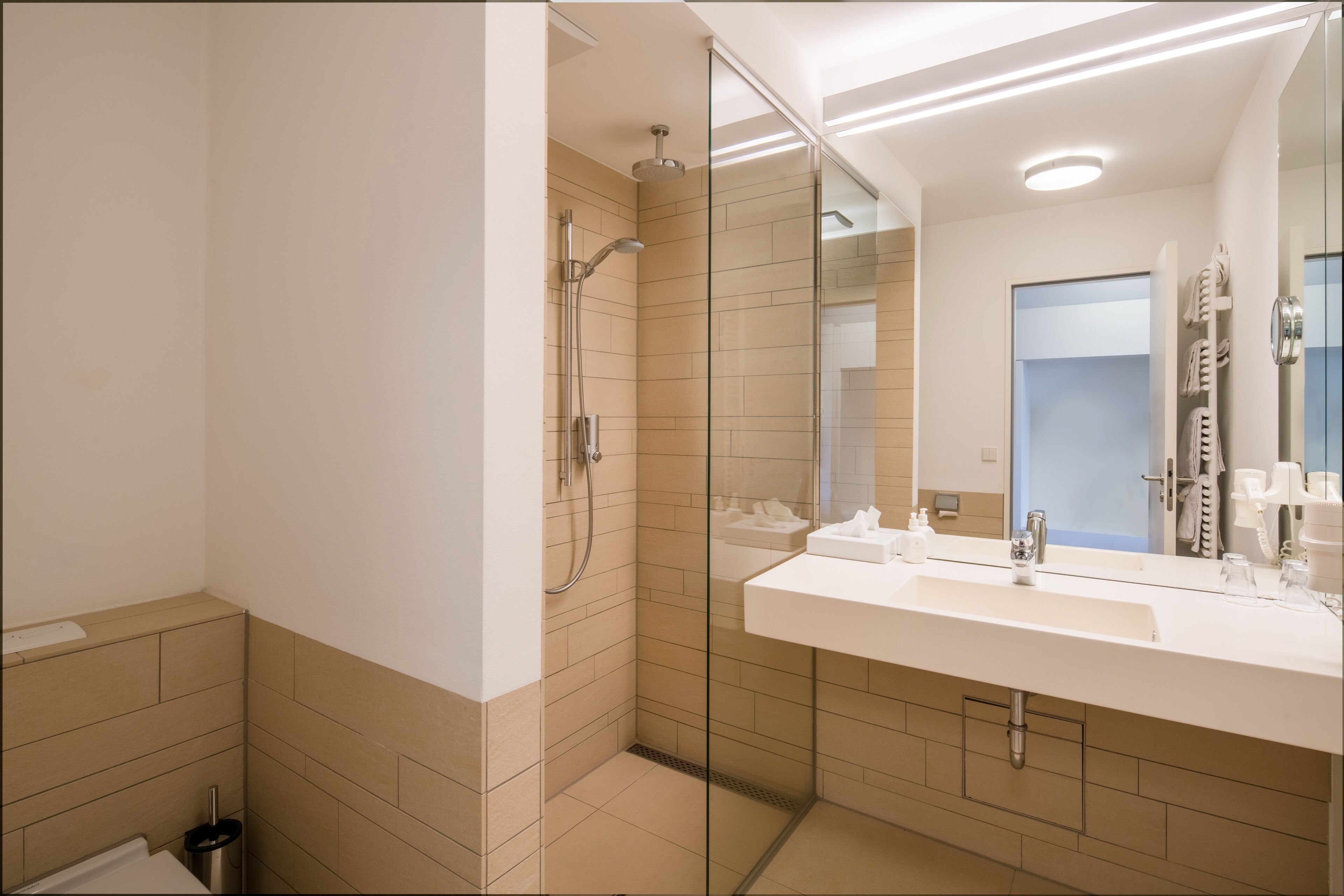 eco-friendly toiletries, hair dryer, towels