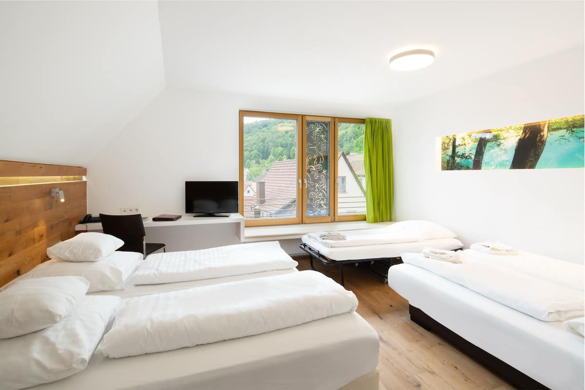 family room for 5 persons | premium bedding, select comfort beds, desk, laptop workspace