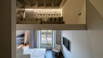 Deep soaking tub, rainfall showerhead, designer toiletries, hair dryer