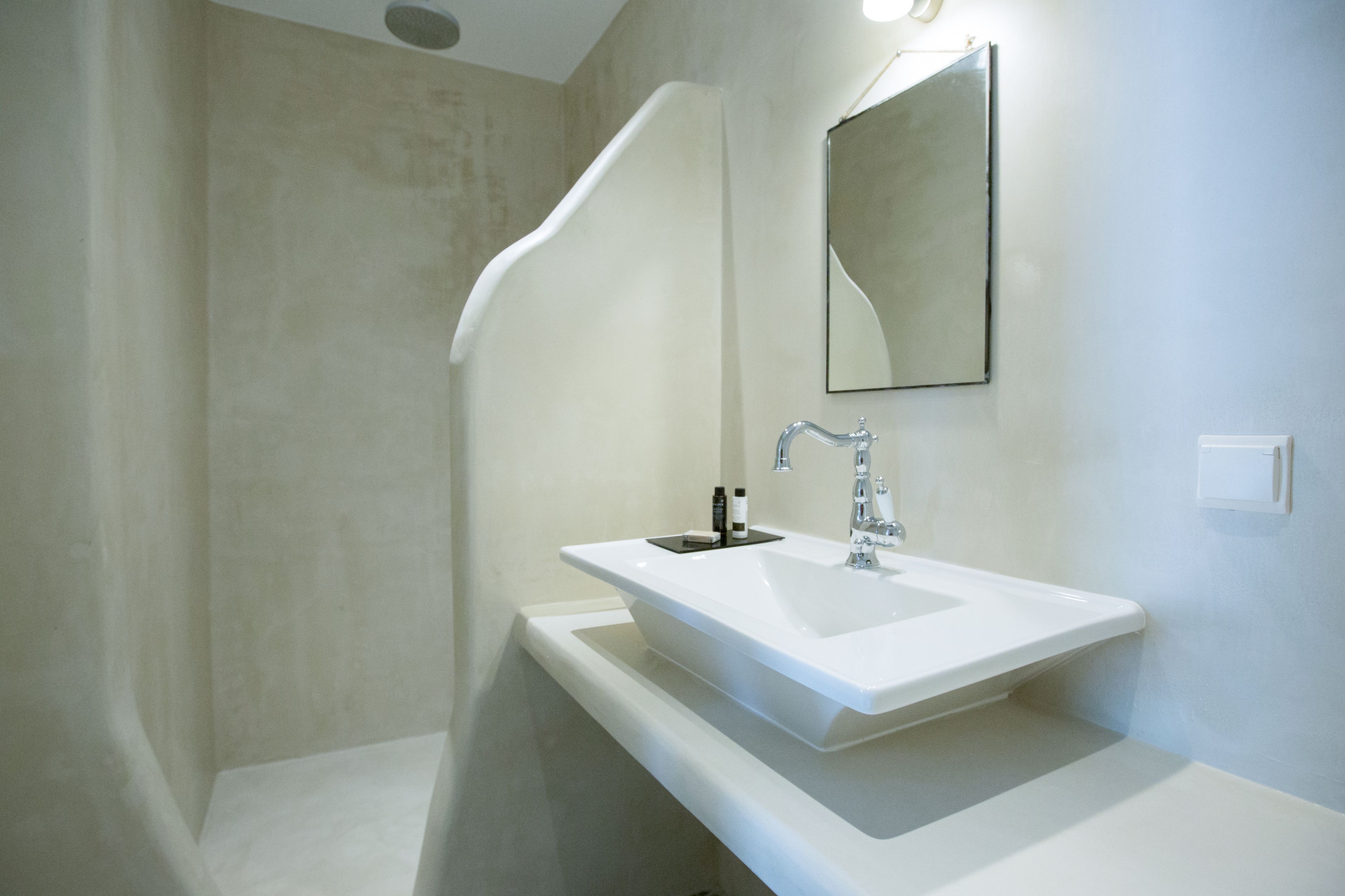 exclusive double room, 1 queen bed, refrigerator, garden area | bathroom | hydromassage showerhead, designer toiletries, hair dryer, slippers