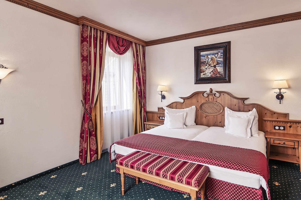 Pillow-top beds, minibar, in-room safe, desk