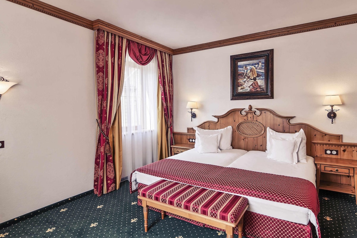 Pillow-top beds, minibar, in-room safe, desk