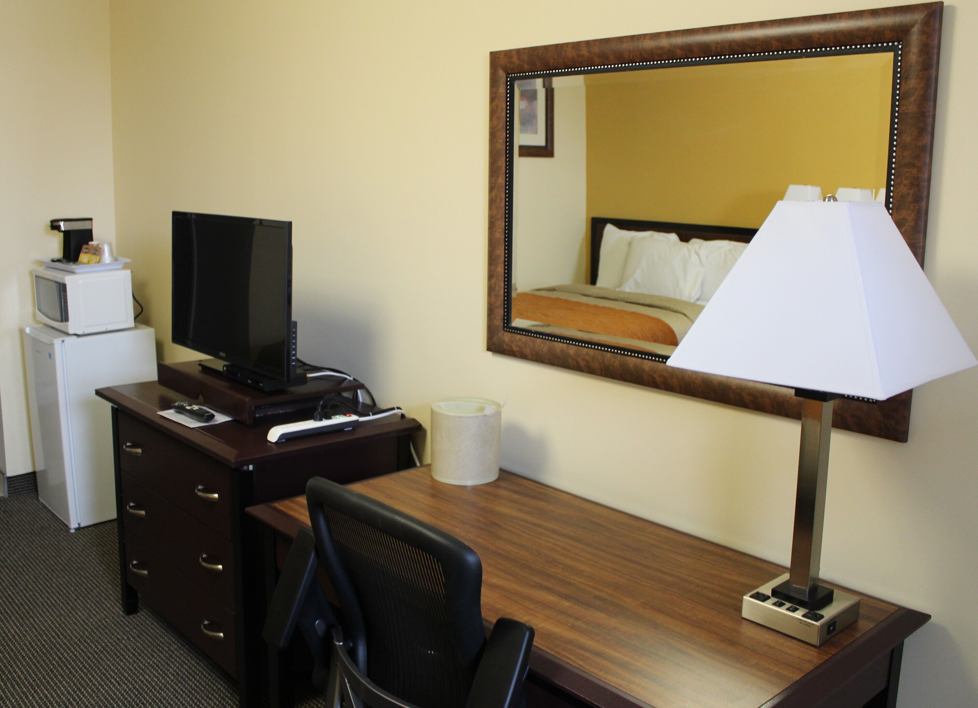 Desk, blackout drapes, soundproofing, iron/ironing board (on request)