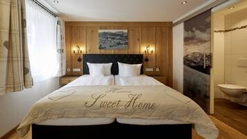 Roba de llit hipoal·lergògena, minibar i caixa forta a l'habitació