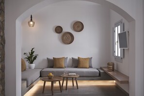 Suite Deluxe, 1 chambre | Coin séjour | Télévisions à écran plasma