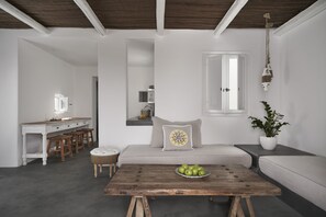 Deluxe Suite, 1 Bedroom | Living area | Plasma TV - Makris Beach Hotel (Santorini)