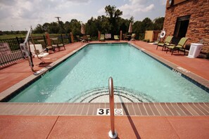 Outdoor pool, open 9:00 AM to 10:00 PM, pool umbrellas, pool loungers
