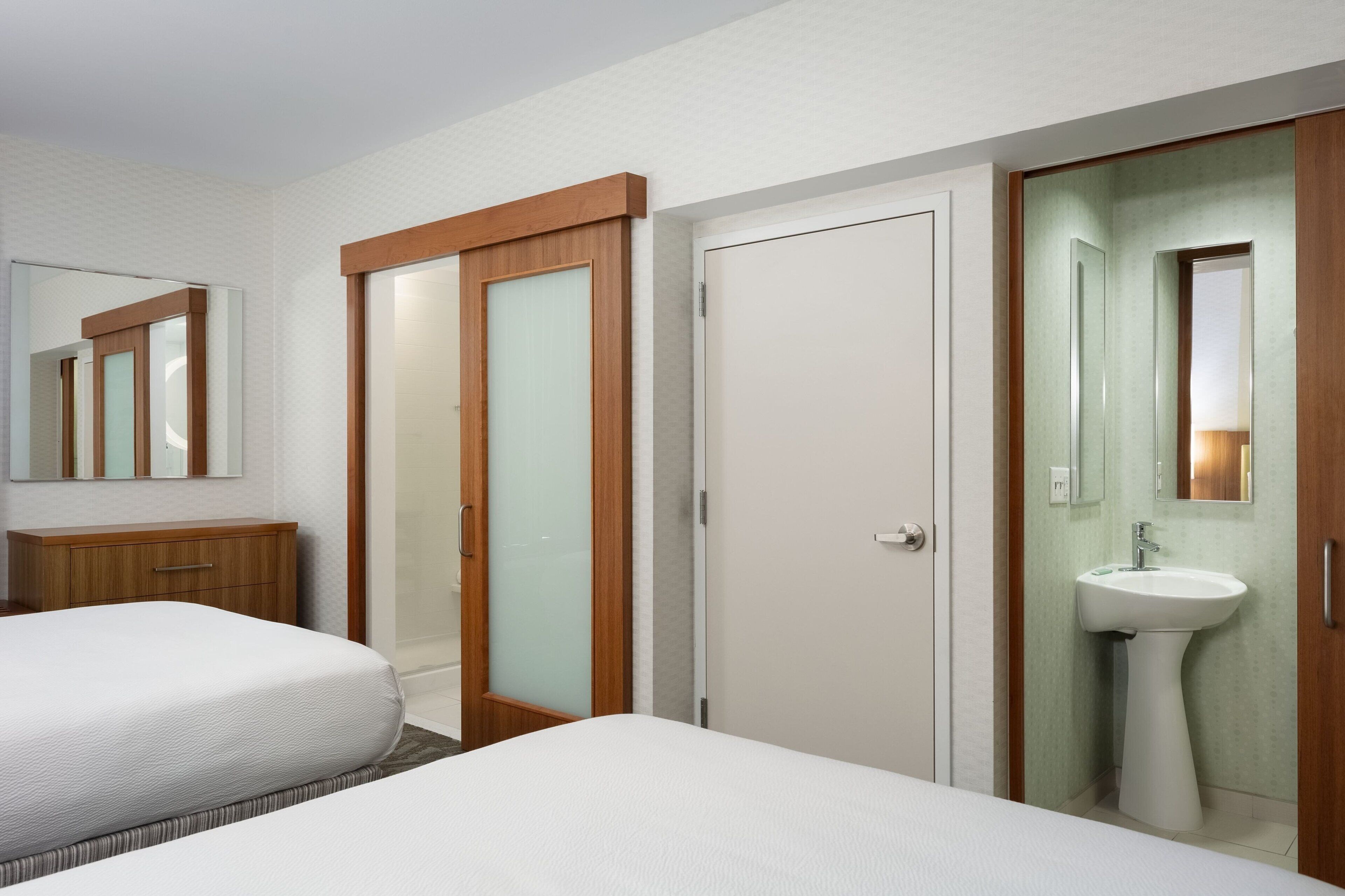 suite, 2 queen beds, non smoking | bathroom | combined shower/bathtub, free toiletries, hair dryer, towels