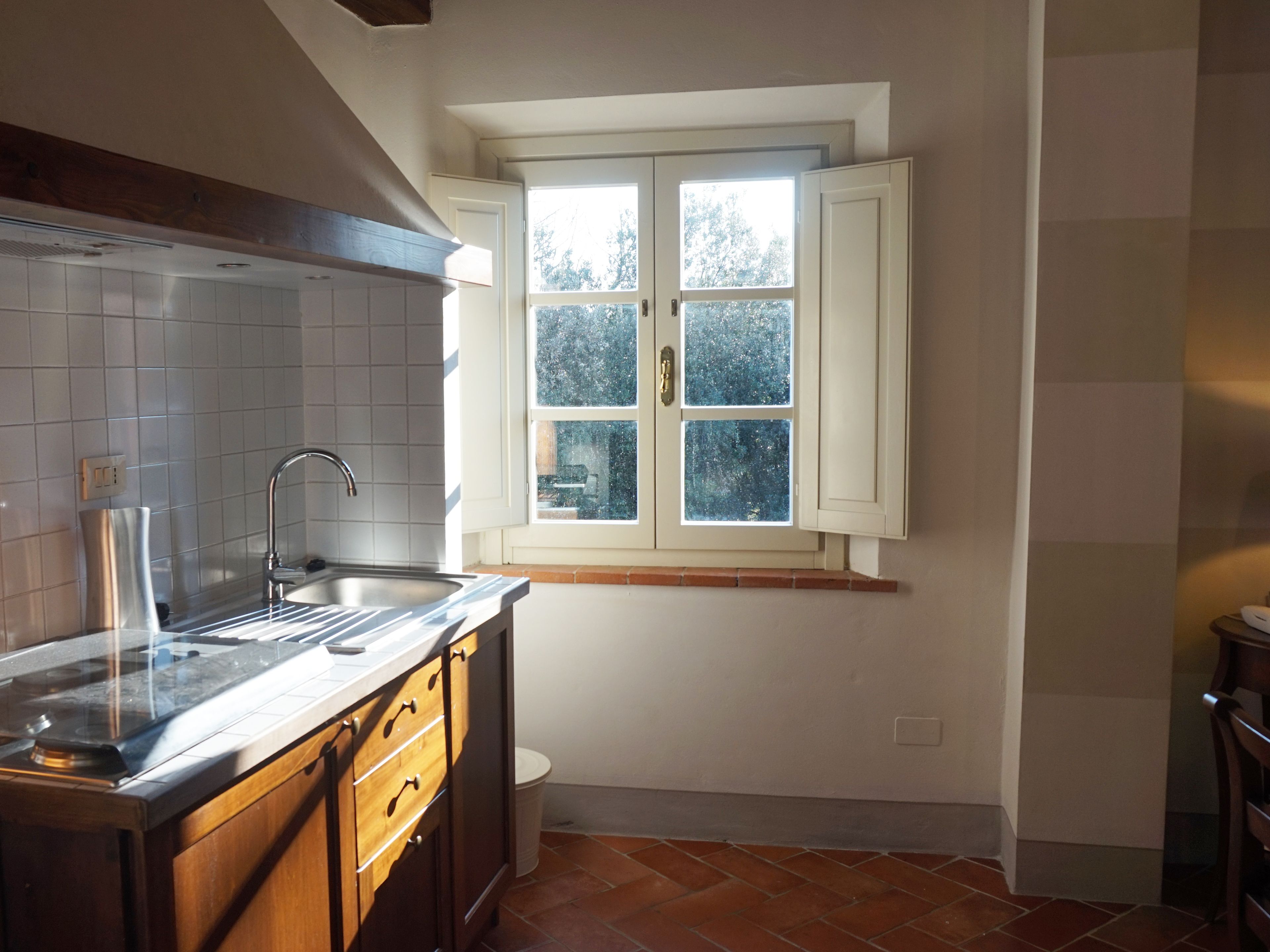 appartamento bilocale | private kitchenette | full-sized fridge, stovetop, coffee/tea maker, cookware/dishes/utensils
