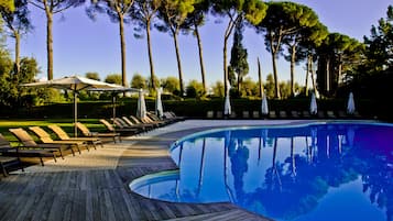 2 outdoor pools, pool umbrellas, pool loungers