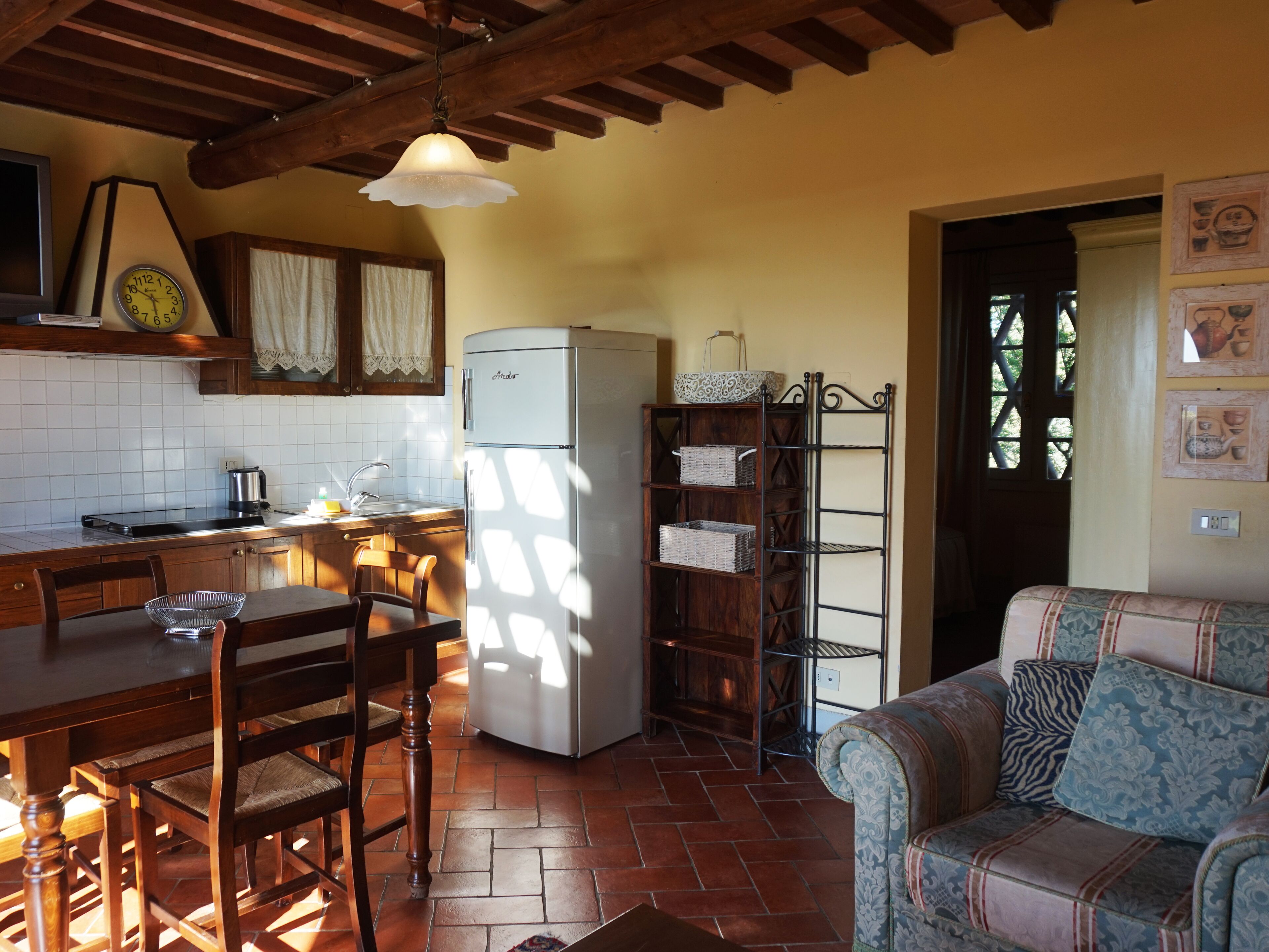 full-sized fridge, stovetop, coffee/tea maker, cookware/dishes/utensils