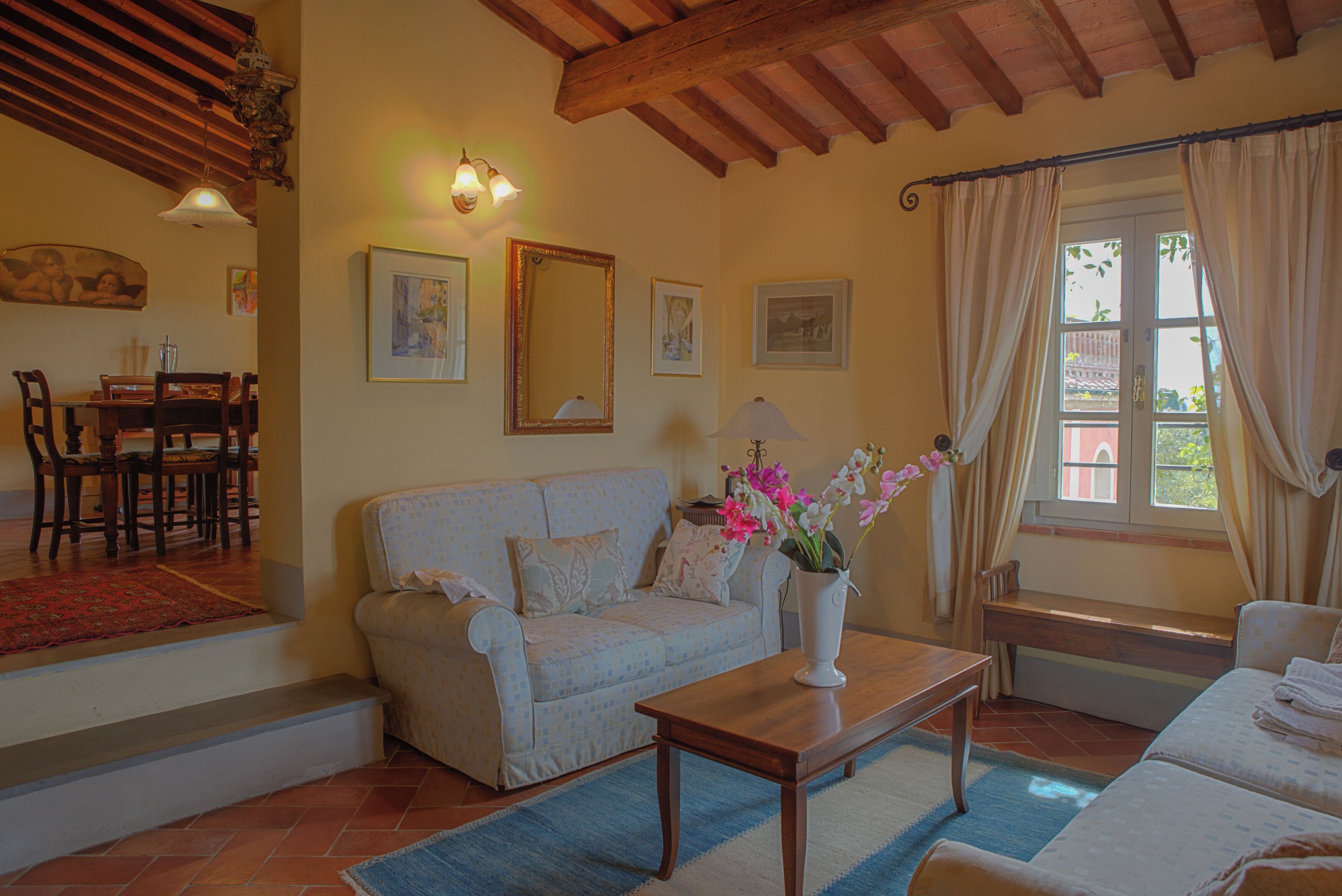 Comfort Condo | Living area | 32-inch TV with satellite channels