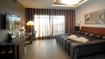 Premium bedding, memory-foam beds, minibar, in-room safe