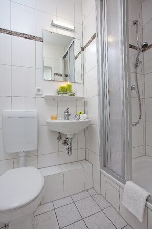 Shower, free toiletries, hair dryer, towels