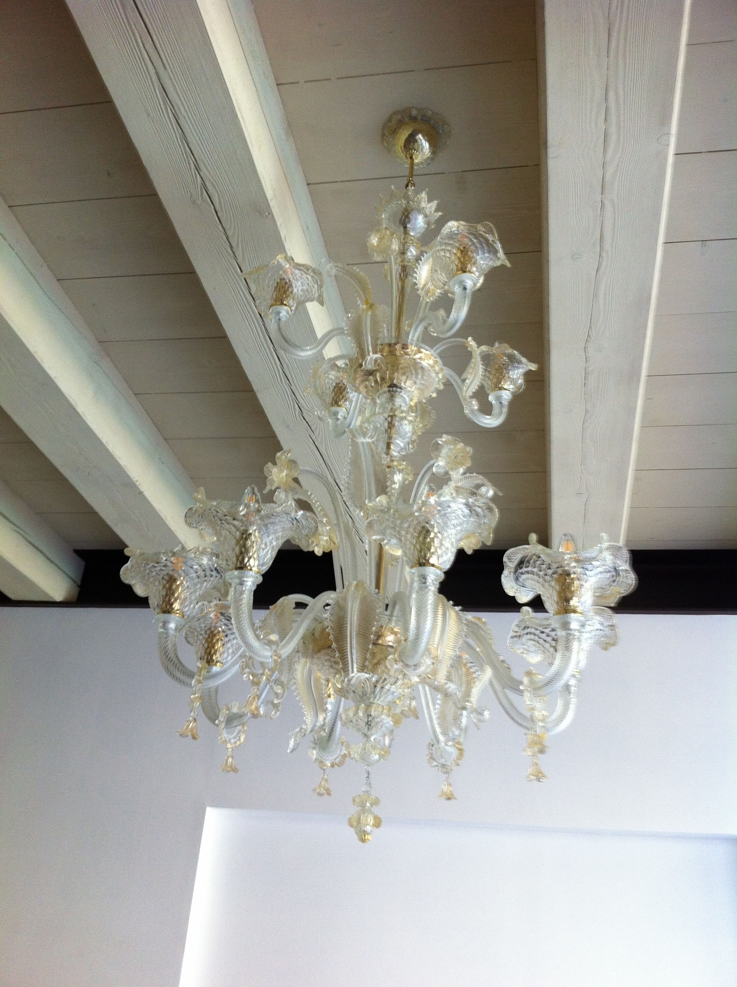 A chandelier with intricate glass and metal design.