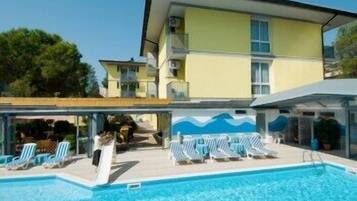 Indoor pool, outdoor pool, pool umbrellas