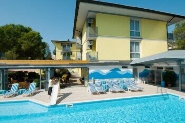 Indoor pool, outdoor pool, pool umbrellas