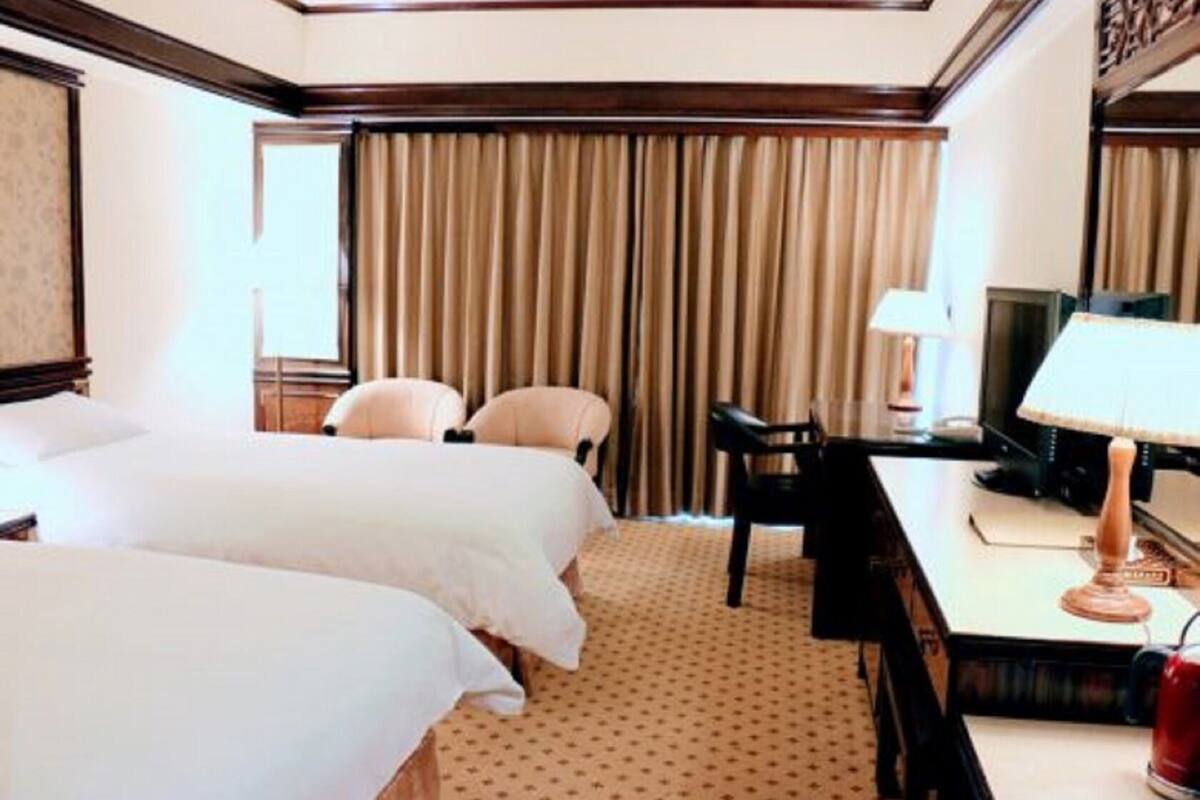 Down comforters, blackout drapes, WiFi (free), bed sheets