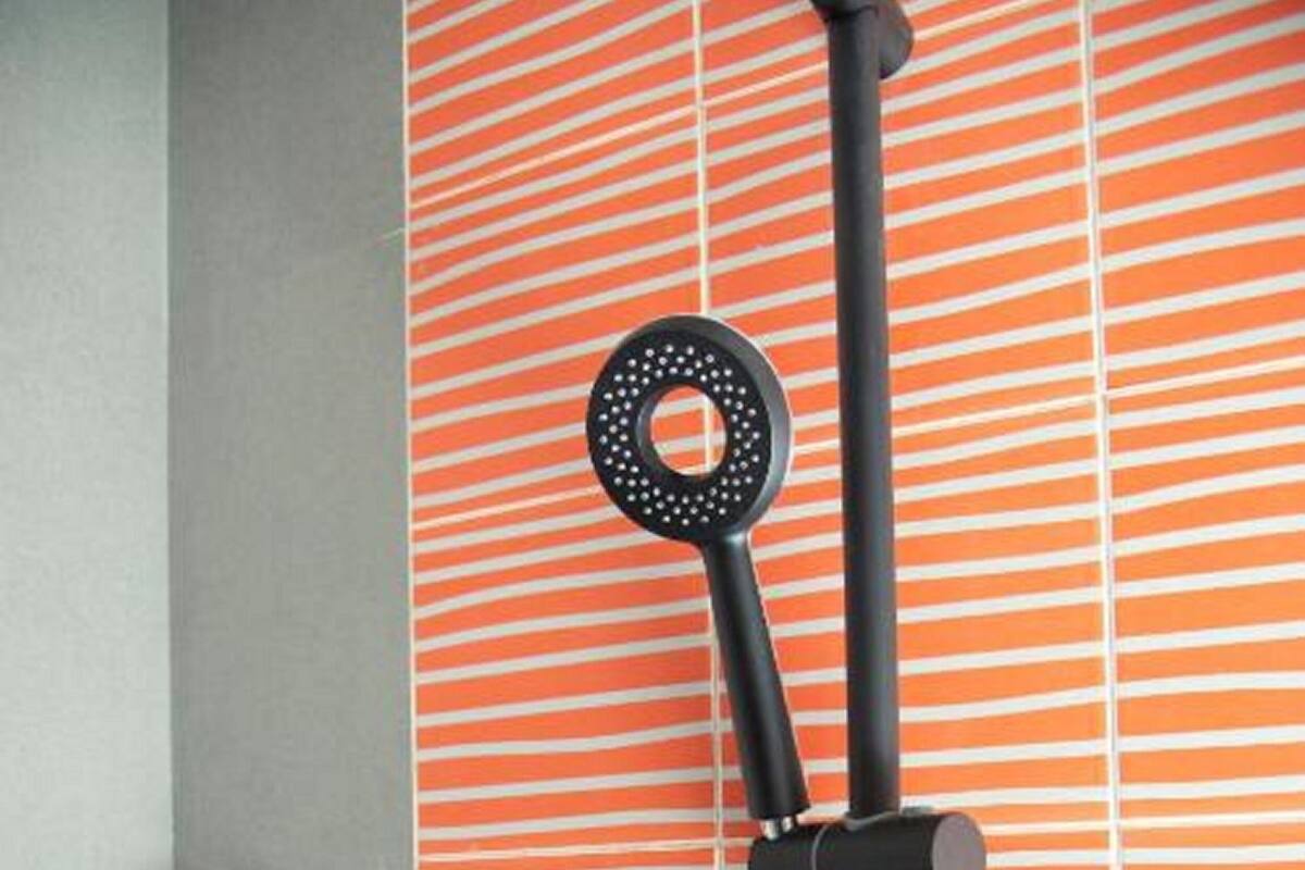 luxe queen room | bathroom | shower, rainfall showerhead, free toiletries, hair dryer