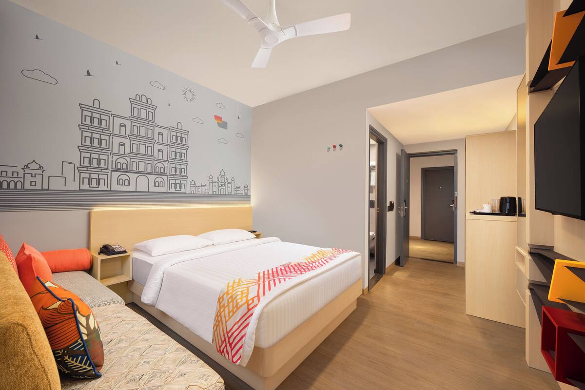 superior room | 1 bedroom, minibar, in-room safe, iron/ironing board