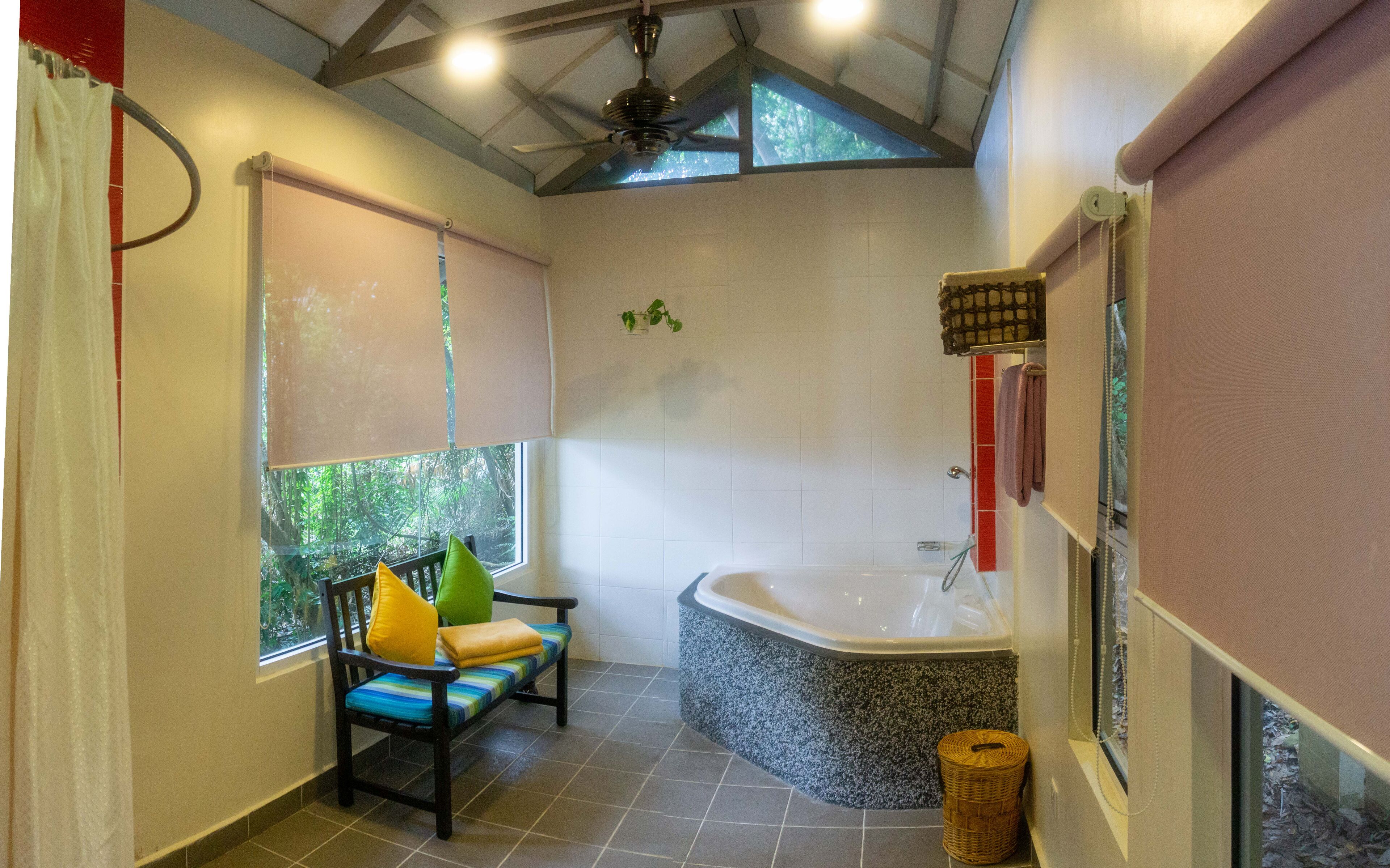 hillside villa single storey + return boat transfer | bathroom | shower, rainfall showerhead, free toiletries, hair dryer