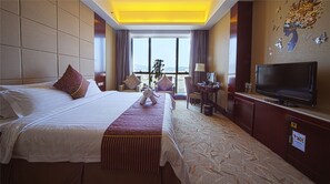 Habitación ejecutiva | Área de sala de estar | Televisión LCD 